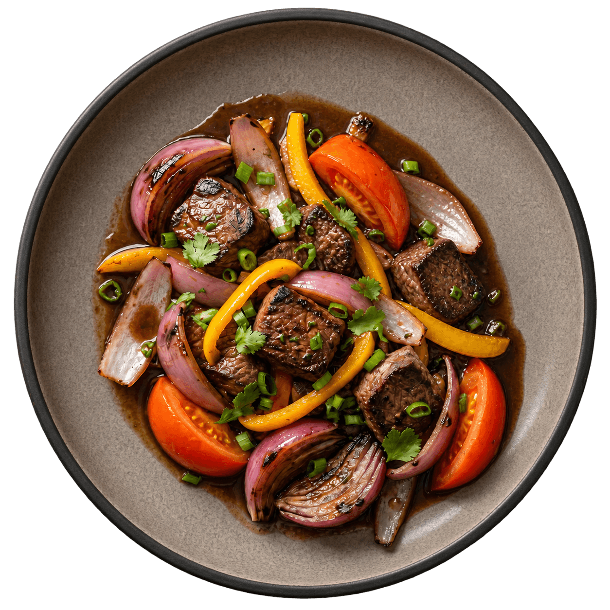 Lomo Saltado stir-fry with beef, onion and tomato